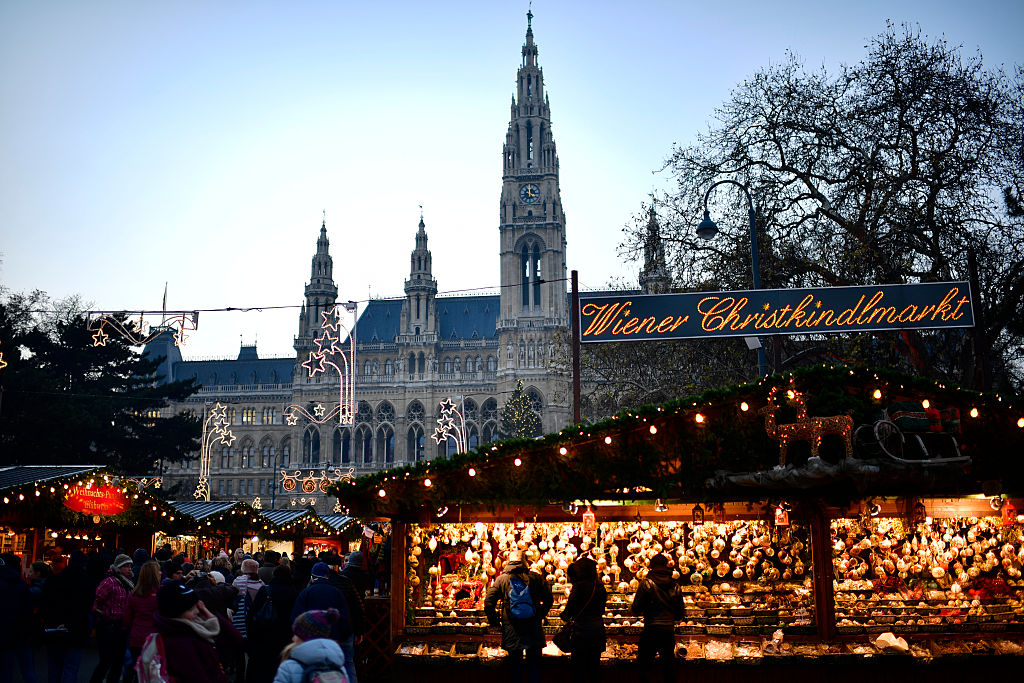 VIENNA, AUSTRIA - DECEMBER 05: The christmas market at the town hall of Vienna is seen during sunset on December 5, 2016 in Vienna, Austria. The town of Vienna is the federal capital of Austria as well as one of the nine federal states, the city has a population of 2.6 million citizens. (Photo by Alexander Koerner/Getty Images)