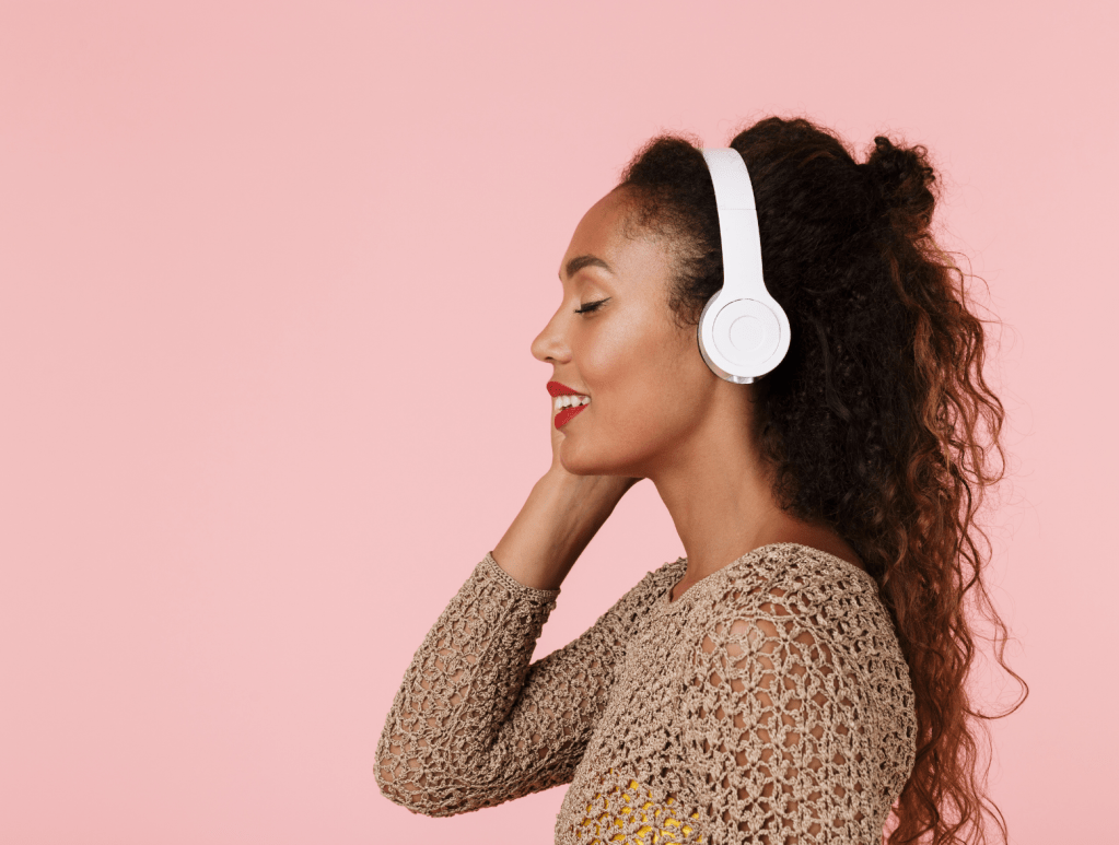 young girl listening to headphones